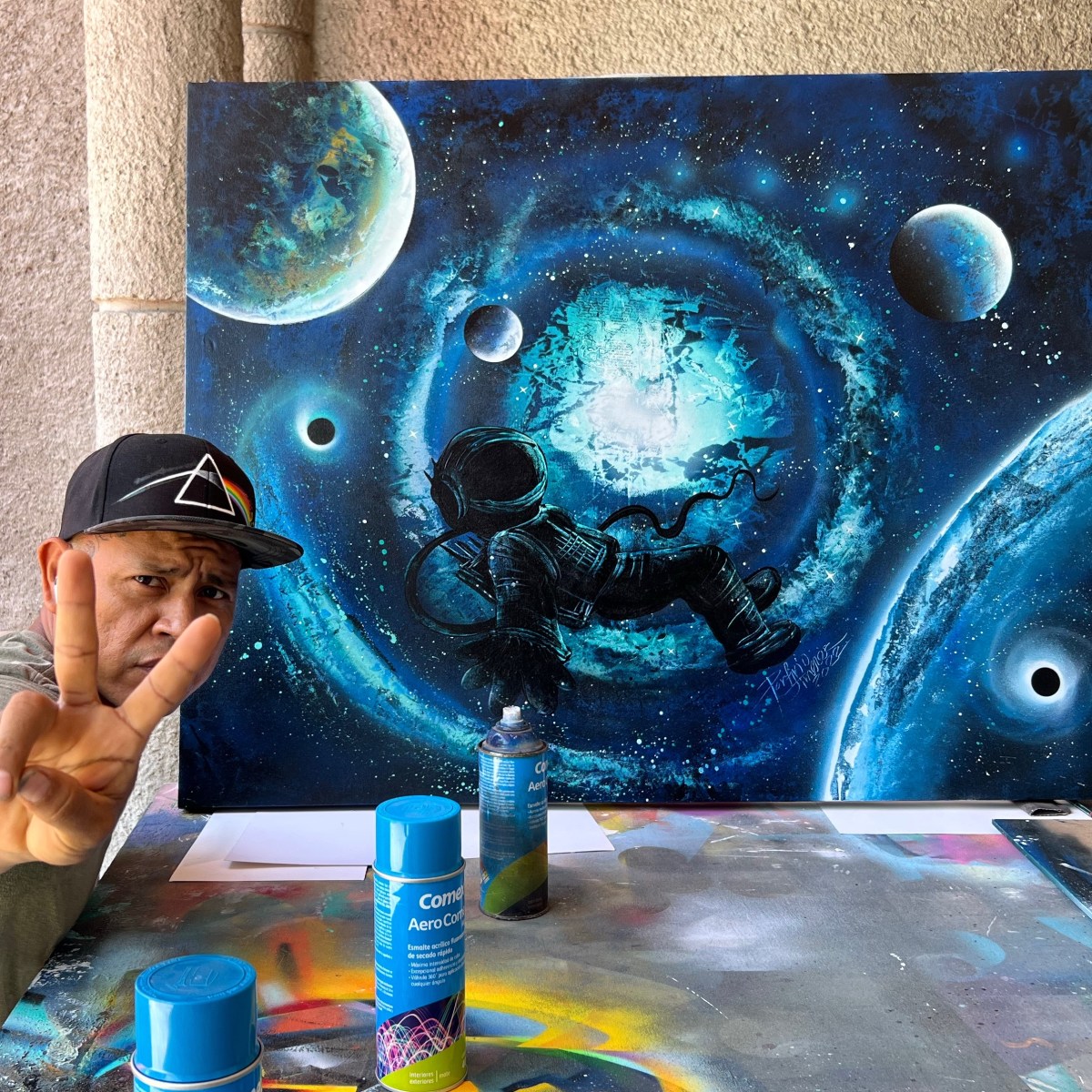 Astronaut spray painting